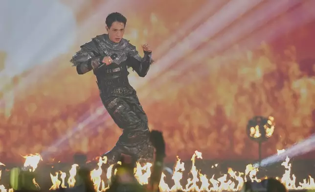 Kyle Alessandro from Norway performs the song 'Lighter' during the dress rehearsal for the first semi-final of the 69th Eurovision Song Contest, in Basel, Switzerland, Monday, May 12, 2025. (AP Photo/Martin Meissner)