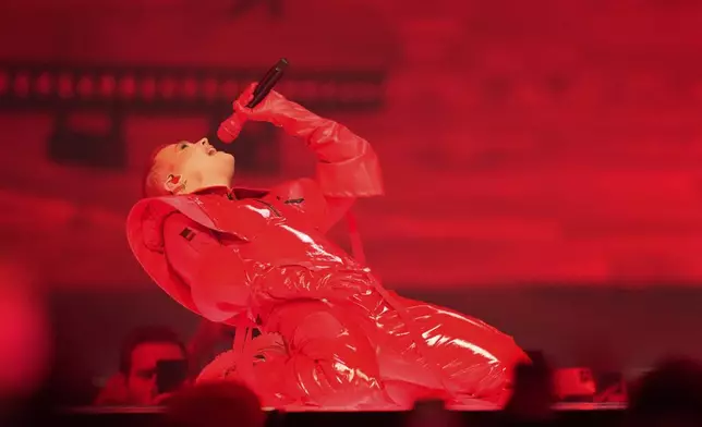 Red Sebastian from Belgium performs the song "Strobe Lights" during the dress rehearsal for the first semi-final of the 69th Eurovision Song Contest, in Basel, Switzerland, Monday, May 12, 2025. (AP Photo/Martin Meissner)