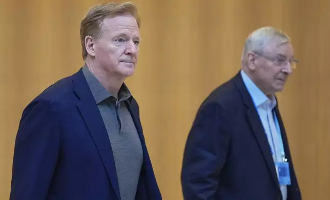 NFL Commissioner Roger Goodell, left, and Buffalo Bills owner Terry Pegula arrive ahead of an NFL football owners' meeting, Tuesday, May 20, 2025, in Eagan, Minn. (AP Photo/Abbie Parr)