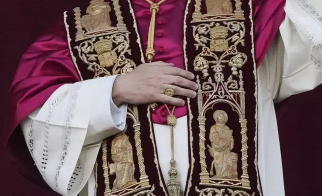 Newly elected Pope Leo XIV appears at the balcony of St. Peter's Basilica at the Vatican, Thursday, May 8, 2025. (AP Photo/Alessandra Tarantino)