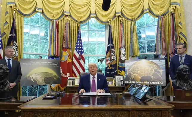 President Donald Trump speaks in the Oval Office of the White House, Tuesday, May 20, 2025, in Washington. (AP Photo/Alex Brandon)