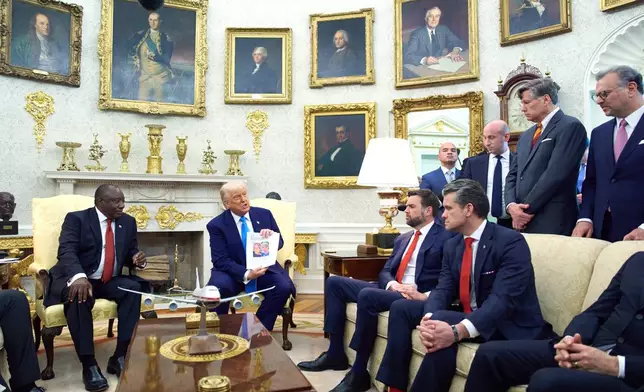 President Donald Trump meets South Africa's President Cyril Ramaphosa in the Oval Office of the White House, Wednesday, May 21, 2025, in Washington. (AP Photo/Evan Vucci)