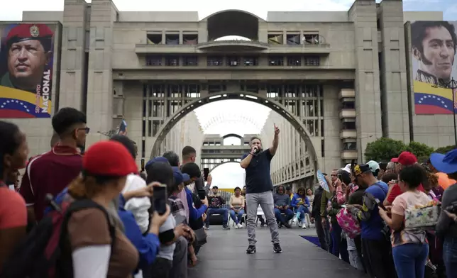 Nicolas Maduro Guerra, son of Venezuelan President Nicolas Maduro, campaigns for National Assembly lawmaker to represent Caracas, with the United Socialist Party of Venezuela (PSUV), in Caracas, Venezuela, Friday, May 9, 2025. (AP Photo/Ariana Cubillos)
