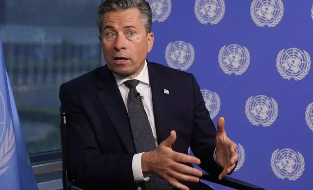 U.N. humanitarian chief Tom Fletcher responds to questions during an interview with The Associated Press at United Nations headquarters, Wednesday, May 14, 2025. (AP Photo/Richard Drew)