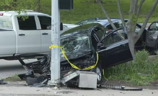 Police investigate the scene where a county deputy was struck and killed by a vehicle on Friday, May 2, 2025 in Cincinnati. (WCPO via AP)