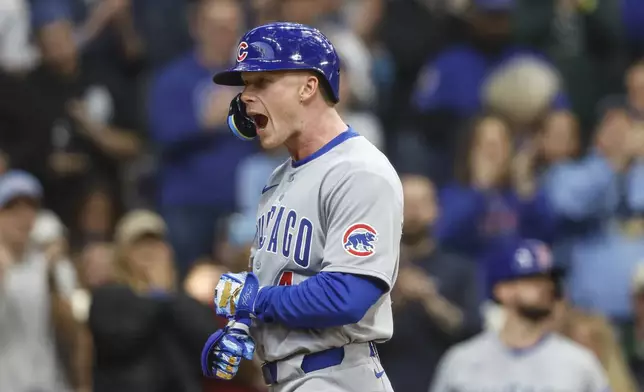 Chicago Cubs' Pete Crow-Armstrong reacts after his three-run home run against the Milwaukee Brewers during the fourth inning of a baseball game, Saturday, May 3, 2025, in Milwaukee. (AP Photo/Jeffrey Phelps)