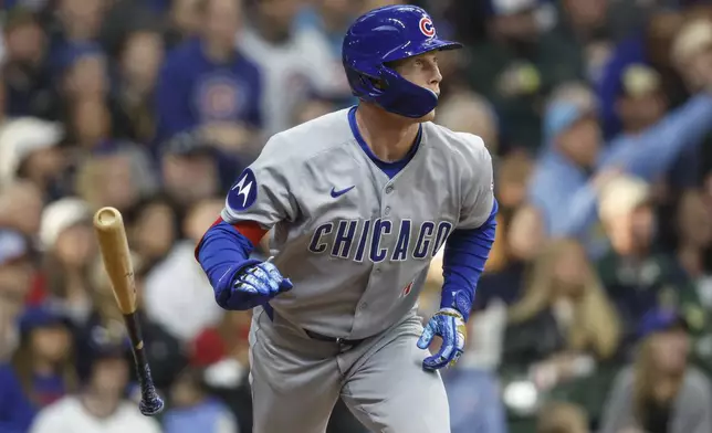 Chicago Cubs' Pete Crow-Armstrong watches his three-run home run against the Milwaukee Brewers during the fourth inning of a baseball game, Saturday, May 3, 2025, in Milwaukee. (AP Photo/Jeffrey Phelps)