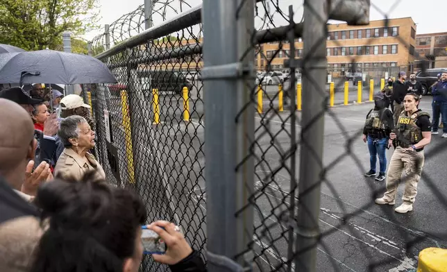 Rep. Bonnie Watson Coleman, D-N.J., speaks with an officer demanding she be let into the ICE Detention office after the arrest of Newark Mayor Ras Baraka, Friday, May 9, 2025, in Newark, N.J. (AP Photo/Angelina Katsanis)