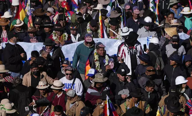 Supporters of former President Evo Morales march towards the offices of the Electoral Tribunal in El Alto, Bolivia, Friday, May 16, 2025. (AP Photo/Juan Karita)