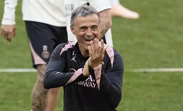 PSG's head coach Luis Enrique gestures during a training session ahead of the Champions League final soccer match between Paris Saint-Germain and Inter Milan in Munich, Germany, Friday, May 30, 2025. (AP Photo/Martin Meissner)