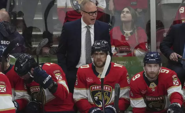 Florida Panthers head coach Paul Maurice gestures during the second period in Game 3 of a second-round NHL hockey playoff series against the Toronto Maple Leafs, Friday, May 9, 2025, in Sunrise, Fla. (AP Photo/Marta Lavandier)