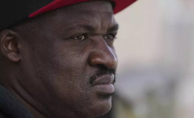 Haitian immigrant Idaneau Mintor, a meat plant worker, reflects on his status in the United States, Tuesday, April 15, 2025, in Dumas, Texas. (AP Photo/Eric Gay)