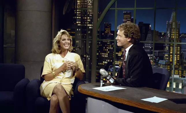 FILE - NBC "Today" show anchor Deborah Norville visited with host David Letterman on "Late Night with David Letterman," September 5, 1990, in New York. (AP Photo, File)