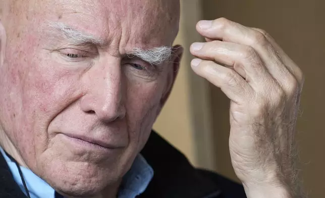 FILE - Brazilian photographer Sebastiao Salgado attends a news conference to unveil his exhibition 'Amazonia', in Milan, Italy, May 11, 2023. Salgado, known for his long-term projects and images of nature and humanity, died at age 81, the Instituto Terra confirmed on Friday, May 23, 2025. (AP Photo/Luca Bruno, File)