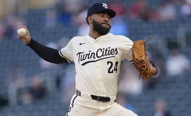 Minnesota Twins starting pitcher Simeon Woods Richardson (24) delivers during the first inning of a baseball game against the Baltimore Orioles, Wednesday, May 7, 2025, in Minneapolis. (AP Photo/Abbie Parr)