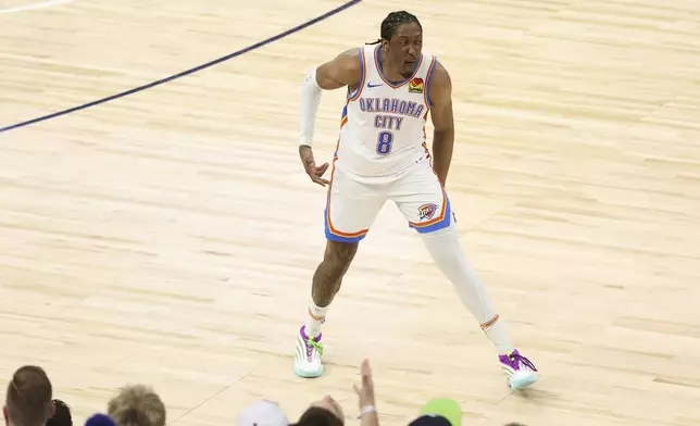 Oklahoma City Thunder forward Jalen Williams reacts in front of fans during the second half of Game 4 of the Western Conference finals of the NBA basketball playoffs against the Minnesota Timberwolves Monday, May 26, 2025, in Minneapolis. (AP Photo/Matt Krohn)