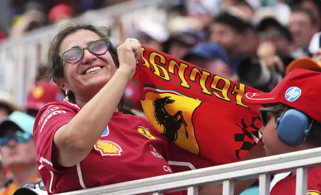 A fan cheers during the qualifying session for the Formula One Miami Grand Prix auto race, Saturday, May 3, 2025, in Miami Gardens, Fla. (AP Photo/Marta Lavandier)