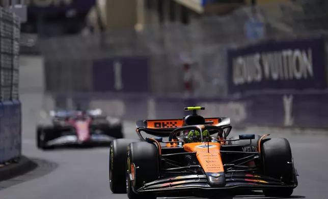 McLaren driver Lando Norris of Britain steers his car during the Formula One Monaco Grand Prix race at the Monaco racetrack in Monaco, Sunday, May 25, 2025. (AP Photo/Manu Fernandez)