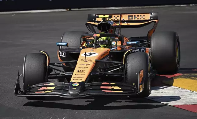 McLaren driver Lando Norris of Britain steers his car during the Formula One Monaco Grand Prix race at the Monaco racetrack in Monaco, Sunday, May 25, 2025. (Gabriel Bouys/Pool Photo via AP)