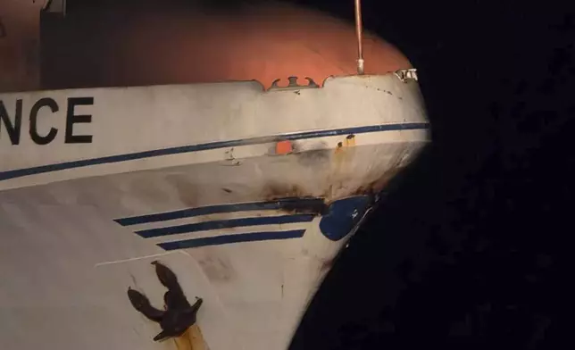 In this photo provided by the Government of Cyprus, a fire burns on the ship The Conscience, after a drone struck the vessel carrying aid to Gaza off the coast of Malta, Friday, May 2, 2025. (Government of Cyprus via AP)