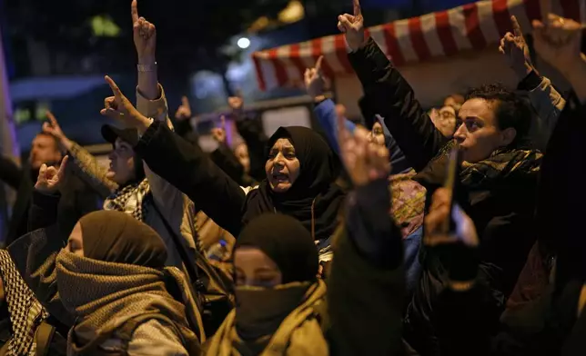 People protest against an Israeli drone attack on a vessel carrying aid to Gaza in international waters off Malta, outside the Israeli consulate in Istanbul, Friday, May 2, 2025. (AP Photo/Khalil Hamra)