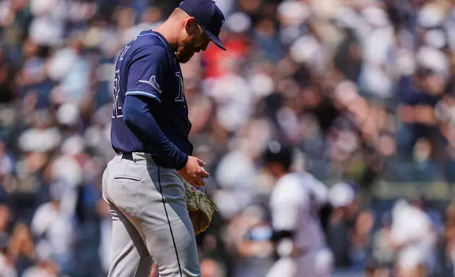 Tampa Bay Rays pitcher Zack Littell reacts as New York Yankees' Austin Wells runs the bases after hitting a home run during the fifth inning of a baseball game, Saturday, May 3, 2025, in New York. (AP Photo/Frank Franklin II)