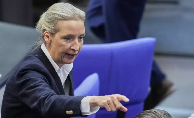 AfD leader Alice Weidel gestures in the parliament Bundestag in Berlin, Tuesday, May 6, 2025. (AP Photo/Ebrahim Noroozi)
