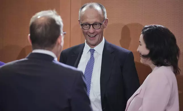 Newly-elected German Chancellor Friedrich Merz attends the first cabinet meeting, at the chancellery in Berlin, late Tuesday, May 6, 2025. (AP Photo/Ebrahim Noroozi)