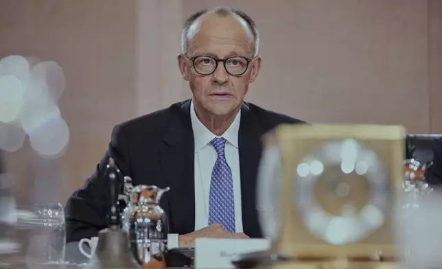 Newly-elected German Chancellor Friedrich Merz attends the first cabinet meeting, at the chancellery in Berlin, late Tuesday, May 6, 2025. (AP Photo/Ebrahim Noroozi)