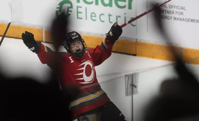 Ottawa Charge forward Rebecca Leslie (37) celebrates her goal against the Minnesota Frost during second period of a PWHL final game, Tuesday May 20, 2025 in Ottawa. (Adrian Wyld/The Canadian Press via AP)