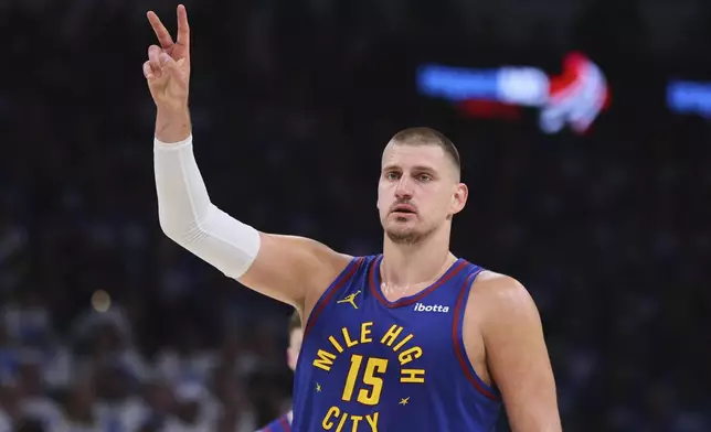 Denver Nuggets' Nikola Jokic gestures in the first half of Game 5 of an NBA basketball second-round playoff series against the Oklahoma City Thunder Tuesday, May 13, 2025, in Oklahoma City. (AP Photo/Nate Billings)