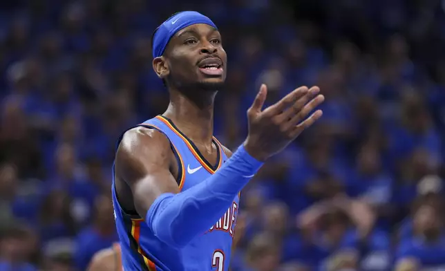 Oklahoma City Thunder guard Shai Gilgeous-Alexander reacts during the second half of Game 2 of an NBA basketball Western Conference Finals playoff series against the Minnesota Timberwolves Thursday, May 22, 2025, in Oklahoma City. (AP Photo/Nate Billings)