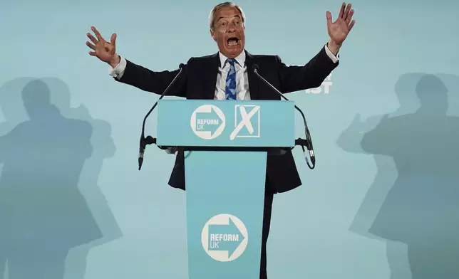 Reform UK party leader Nigel Farage speaks during a campaign event at Stafford Showground, Stafford, England, whilst campaigning for this week's local elections, Wednesday April 30, 2025. (Jacob King/PA via AP)