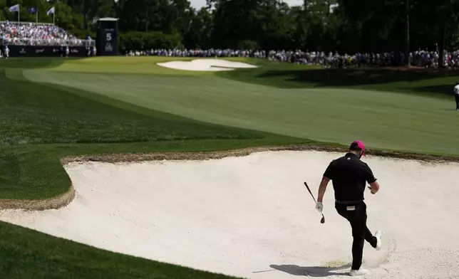 Jon Rahm, of Spain, reacts on the fifth hole during the final round of the PGA Championship golf tournament at the Quail Hollow Club, Sunday, May 18, 2025, in Charlotte, N.C. (AP Photo/George Walker IV)