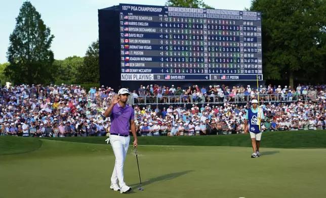 Davis Riley waves after the final round of the PGA Championship golf tournament at the Quail Hollow Club, Sunday, May 18, 2025, in Charlotte, N.C. (AP Photo/Matt York)