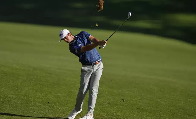 Davis Riley hits from the fairway on the 18th hole during the third round of the PGA Championship golf tournament at the Quail Hollow Club, Saturday, May 17, 2025, in Charlotte, N.C. (AP Photo/Matt York)