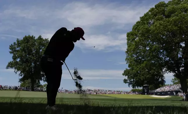 Jon Rahm, of Spain, hits from the rough on the second hole during the final round of the PGA Championship golf tournament at the Quail Hollow Club, Sunday, May 18, 2025, in Charlotte, N.C. (AP Photo/George Walker IV)