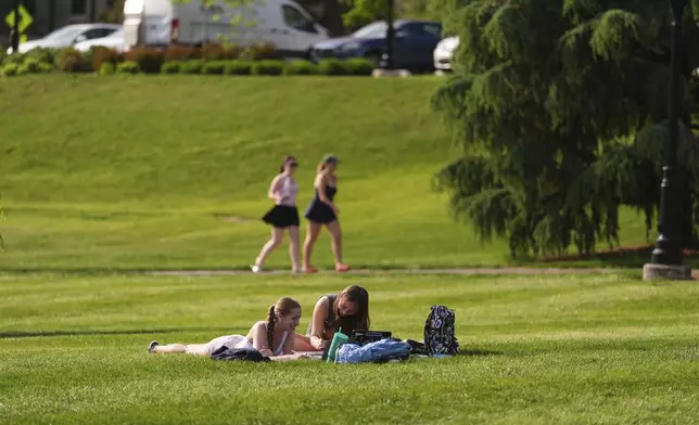 Students enjoy their break at the Villanova University campus, Thursday, May 8, 2025 in Villanova, Pa. (AP Photo/Matt Slocum)