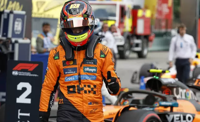 McLaren driver Oscar Piastri of Australia celebrates his pole position after the qualifying session ahead of the Spanish Grand Prix Formula One race at the Barcelona Catalunya racetrack in Montmelo, near Barcelona, Spain, Saturday, May 31, 2025. (AP Photo/Joan Monfort)