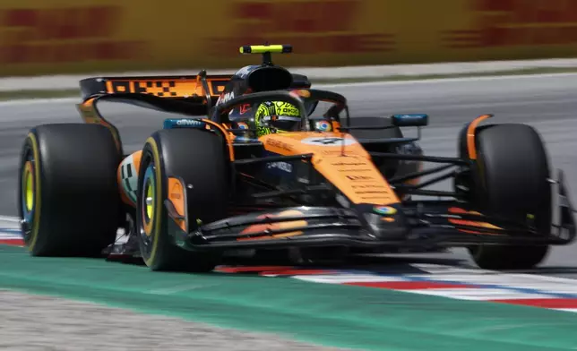 McLaren driver Lando Norris of Britain steers his car during the third free practice ahead of the Spanish Grand Prix Formula One race at the Barcelona Catalunya racetrack in Montmelo, near Barcelona, Spain, Saturday, May 31, 2025. (AP Photo/Joan Monfort)