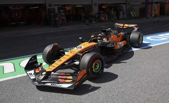 McLaren driver Oscar Piastri of Australia steers his car during the qualifying session ahead of the Spanish Grand Prix Formula One race at the Barcelona Catalunya racetrack in Montmelo, near Barcelona, Spain, Saturday, May 31, 2025. (Juan Medina/Pool Photo via AP)