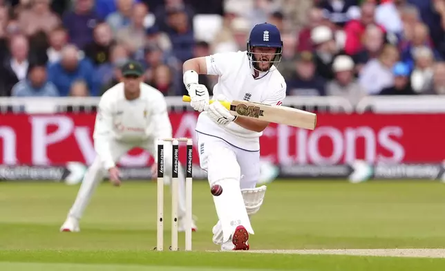 England's Ben Duckett, front, in action on day one of the Rothesay International Test series cricket match between England and Zimbabwe in Nottingham, England, Thursday May 22, 2025. (Mike Egerton/PA via AP)