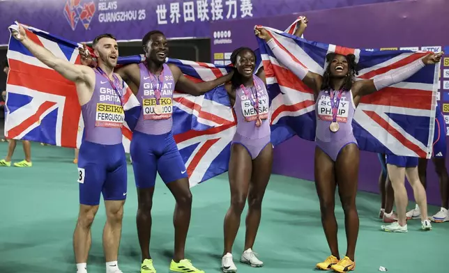 British sprinters from left; Joe Ferguson, Jeriel Quainoo, Kissiwaa Mensah, and Asha Philip celebrate after winning the bronze medals in 4x100 meters mixed relay at the World Athletics Relay, in Guangzhou in south China's Guangdong province on Sunday, May 11, 2025. (Chinatopix Via AP)