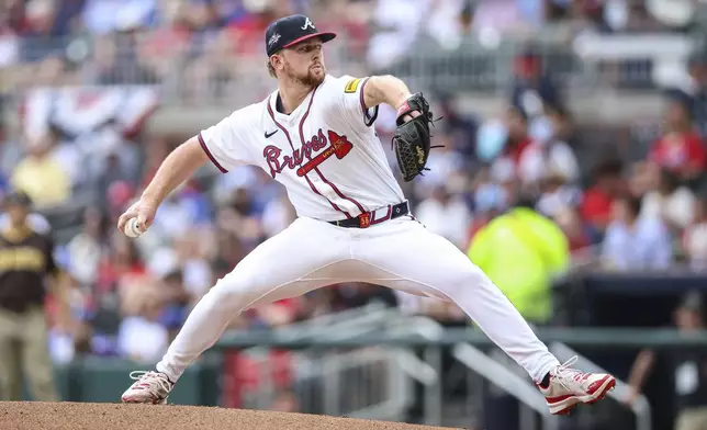 Atlanta Braves pitcher Spencer Schwellenbach delivers in the second inning of a baseball game against the San Diego Padres, Sunday, May 25, 2025, in Atlanta. (AP Photo/Colin Hubbard)