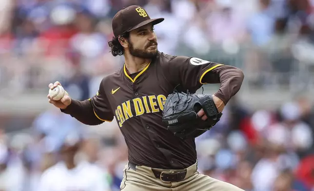 San Diego Padres pitcher Dylan Cease delivers in the first inning of a baseball game against the Atlanta Braves, Sunday, May 25, 2025, in Atlanta. (AP Photo/Colin Hubbard)