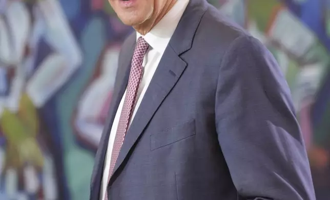 German Chancellor Friedrich Merz arrives for the cabinet meeting at the chancellery in Berlin, Germany, Wednesday, May 28, 2025. (AP Photo/Markus Schreiber)