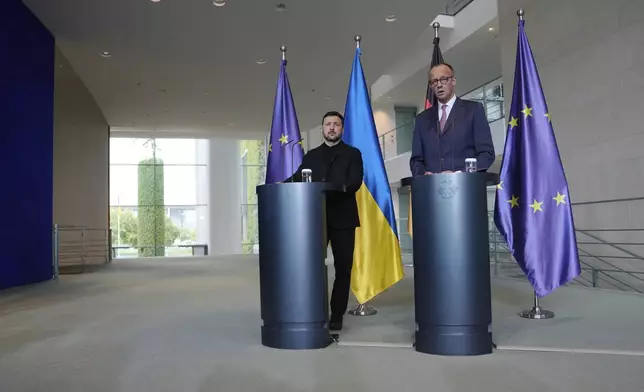 Germany's Chancellor Friedrich Merz, right, and Ukraine's President Volodymyr Zelenskyy attend a news conference at the chancellery in Berlin, Germany, Wednesday, May 28, 2025.(AP Photo/Markus Schreiber)