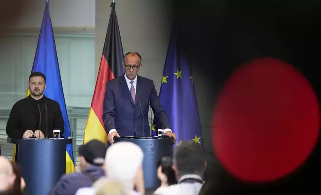 Germany's Chancellor Friedrich Merz, right, and Ukraine's President Volodymyr Zelenskyy attend a news conference at the chancellery in Berlin, Germany, Wednesday, May 28, 2025.(AP Photo/Markus Schreiber)