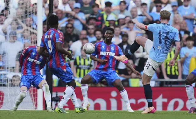 Manchester City's Kevin De Bruyne kicks the ball during the English FA Cup final soccer match between Crystal Palace and Manchester City at Wembley stadium in London, Saturday, May 17, 2025. (AP Photo/Kirsty Wigglesworth)