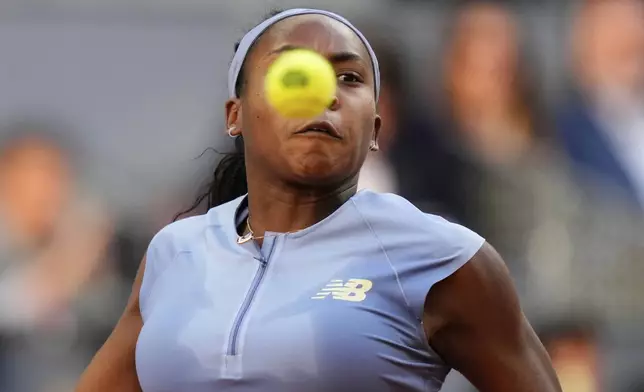 United States' Coco Gauff returns to Aryna Sabalenka of Belarus during the Madrid Open tennis final in Madrid, Spain, Saturday, May 3, 2025. (AP Photo/Jose Breton)
